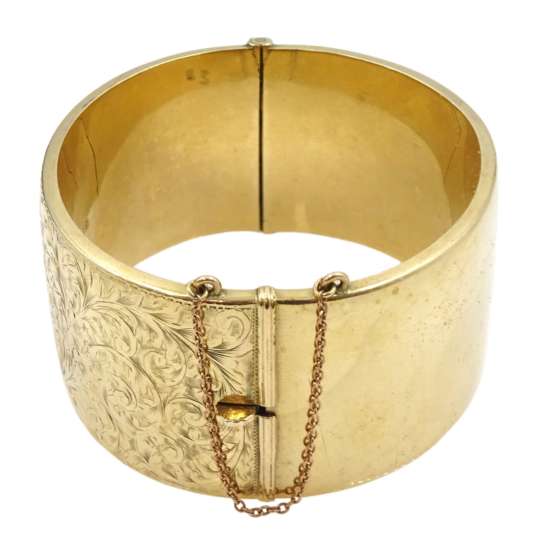 9ct gold wide hinged bangle, with bright cut foliate decoration, by Smith & Pepper Ltd, Birmingham 1963, boxed