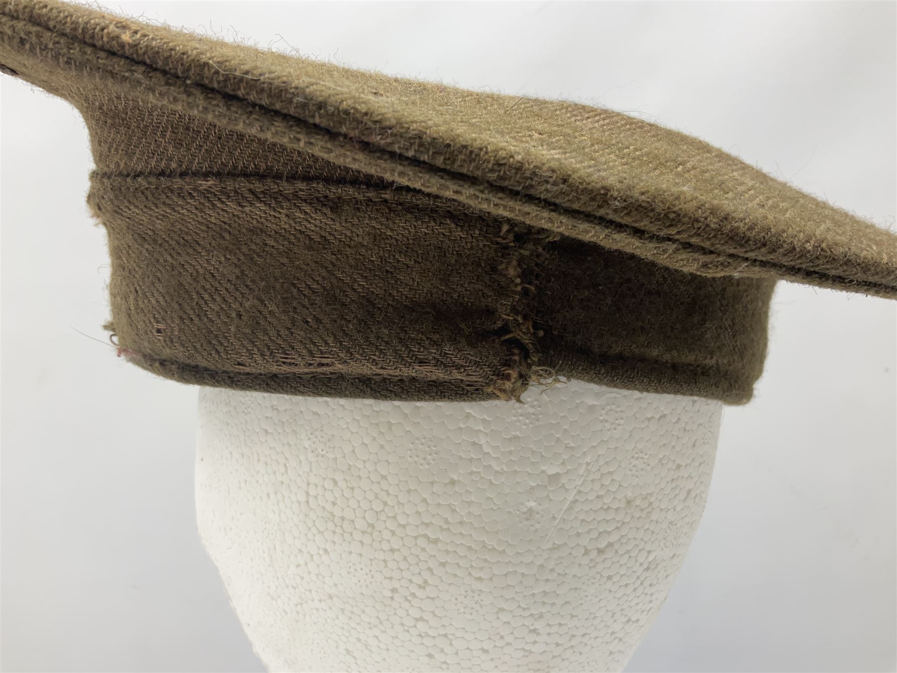 WW1 British Army stiff trench cap with Tank Corps cap badge