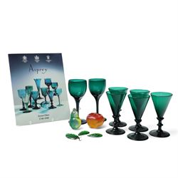 Five green wine glasses of early 19th century design with conical bowls and double knop st...