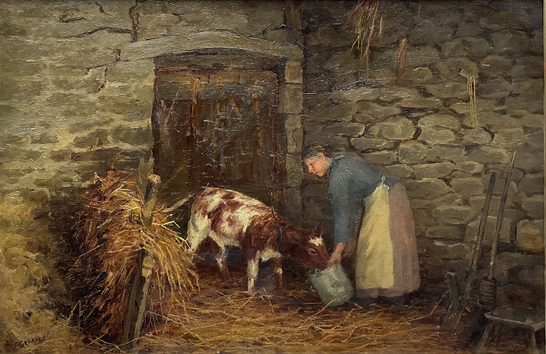 William Greaves (British 1852-1938): Farmer's Wife Feeding a Calf in Stable setting, oil on canvas signed 39cm x 59cm
