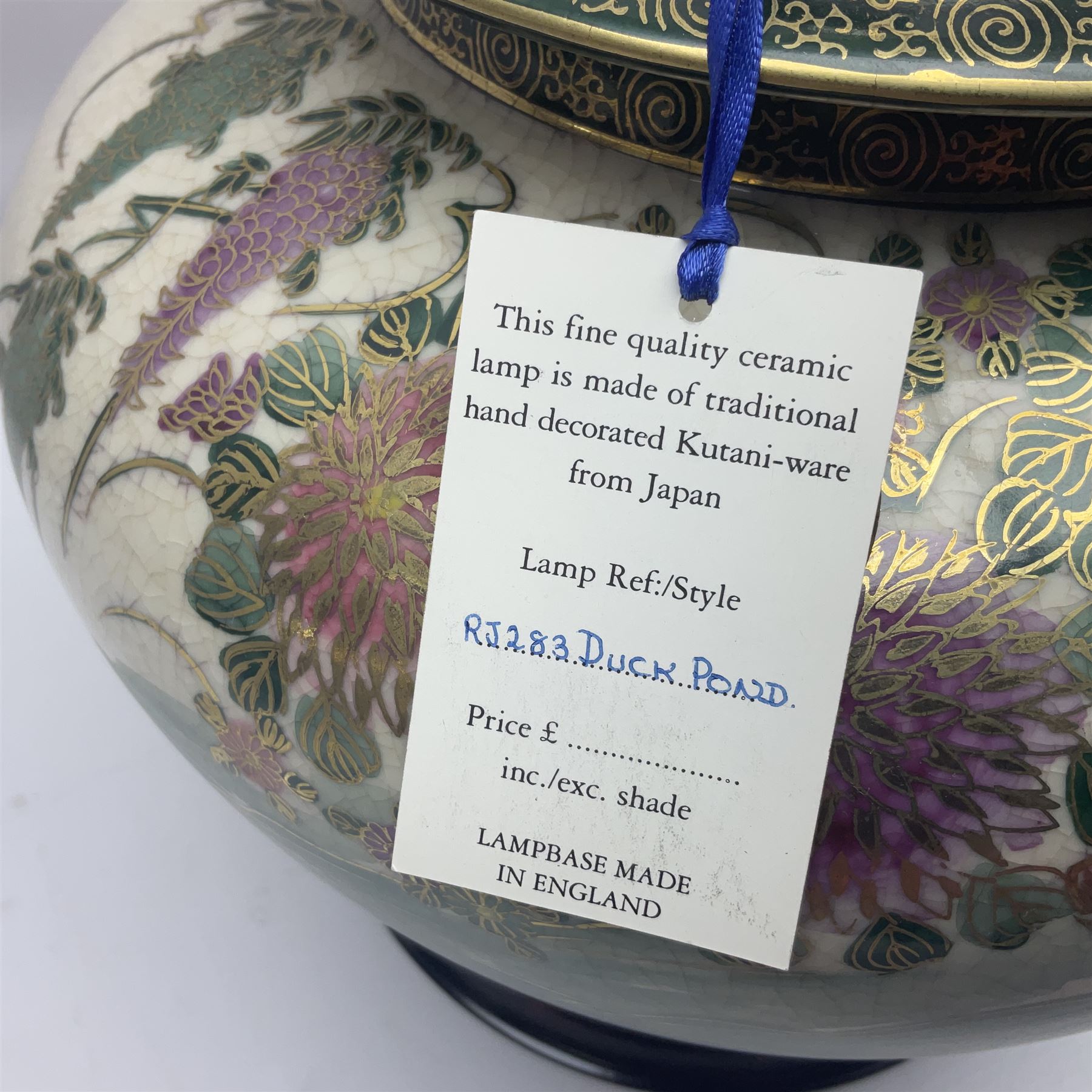 Table lamp of squat baluster form, decorated with Mandarin ducks and floral  landscape, upon a circular wooden base H42cm