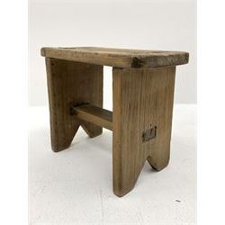 19th century vernacular elm plank stool, rectangular top on end supports joined by flat stretcher