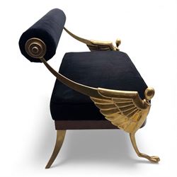 Late 20th century pair of Empire inspired brass metal framed two-seater sofas, upholstered in black velvet with cylindrical backrest and sphinx form arms terminating in paw feet, together with matching deep buttoned black velvet footstool on brass capped legs (Footstool H 38cm, W 70cm, D 70cm)