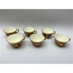 Royal Worcester tea service for six, hand painted with fruits and heightened with gilt, signed J Smith, comprising teapot, teacups, saucers, side plates, sucrier, milk jug and plate, each with black printed mark beneath 