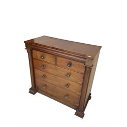 Late 19th century flame mahogany chest, disguised frieze drawer above two short and three long drawers with wooden handles, flanked by turned pilasters, on plinth base with stepped feet