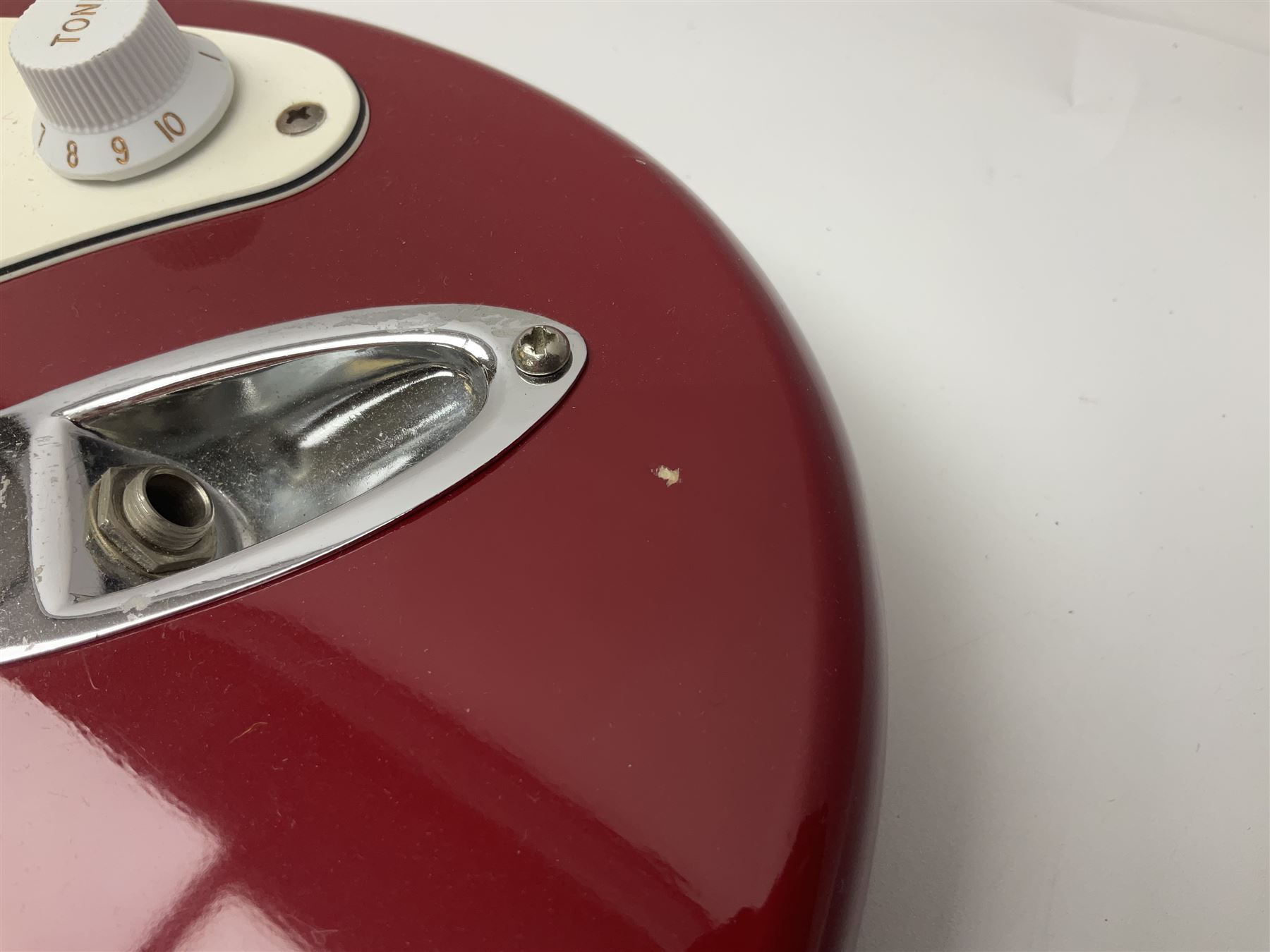 1990s Korean Squier Fender Stratocaster electric guitar in cherry red; serial no.S965951, L98cm