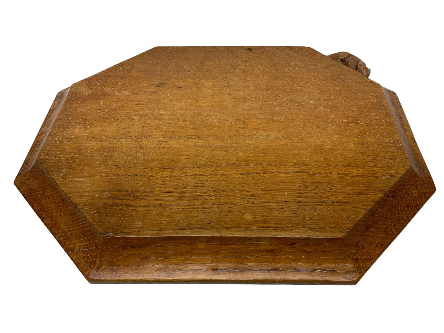Mouseman adzed oak breadboard, canted rectangular form with moulded