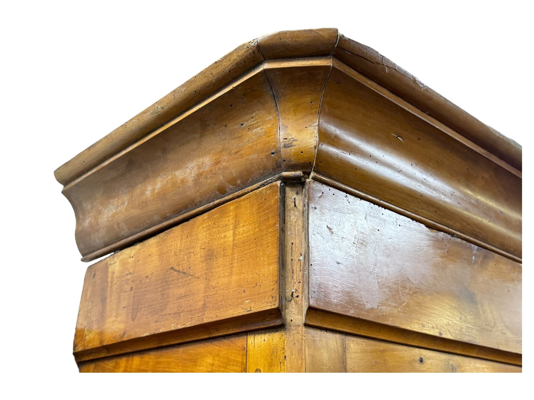 19th century French walnut dresser, the moulded cornice over two-panelled cupboard doors, enclosing two shelves and one small
drawer, on a base of two further cupboards