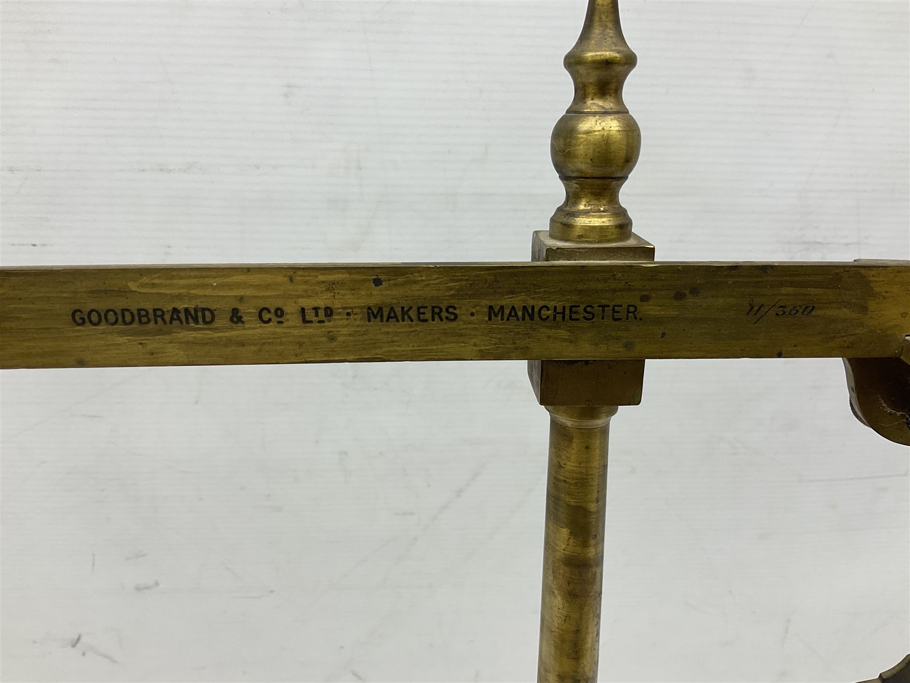 Victorian brass yarn scale by Goodbrand & Co, Manchester on cast iron tri-form base, H56cm