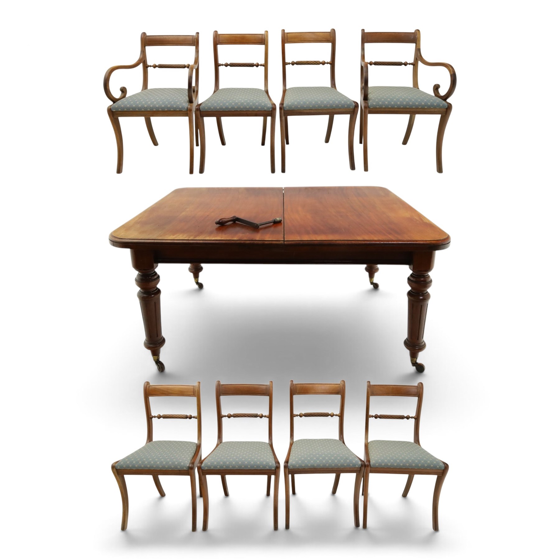 19th century mahogany extending dining table, rectangular top with rounded corners raised on turned and fluted supports with brass cups and castors, with two additional leaves; with set of eight (6+2) Regency design mahogany dining chairs, spiral-reeded back-bar over drop-in seats and sabre supports (W54cm H85cm)
