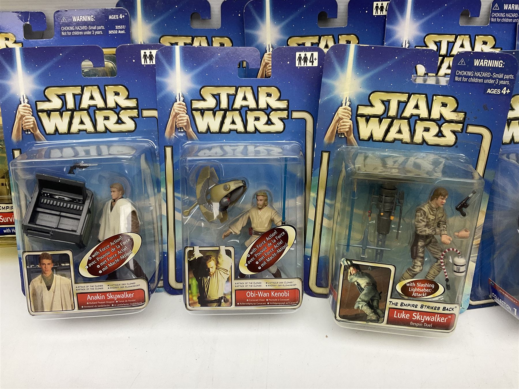 Star Wars - twenty-nine carded action figures comprising fourteen Attack of the Clones; six The Empire Strikes Back; four Return of the Jedi; and five others; all unopened blister packs (29)