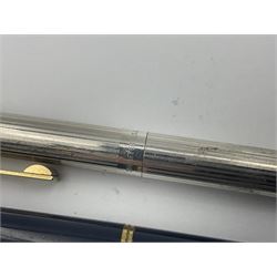 Sheaffer Targa 1011 Diamond Square fountain pen, the gold plated barrel with nib stamped 14K 585, together with another Sheaffer Targa fountain pen with blue barrel and gold nib stamped 14K 585 and matching ballpoint, and Sheaffer ballpoint pen with sterling silver barrel, largest L13.5cm (4)