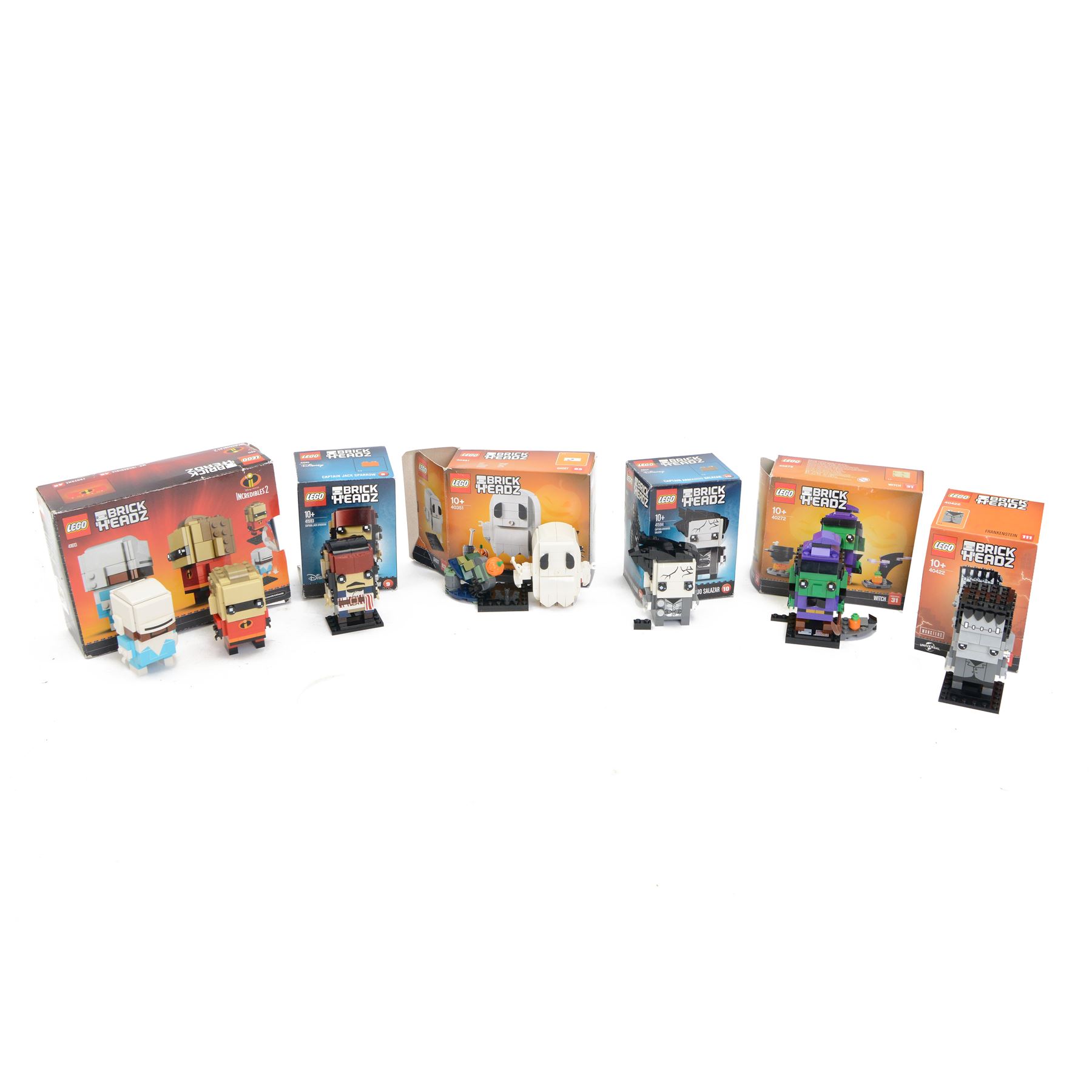 Six Lego Brick Headz built figures, comprising 40351 Ghost, 40272 Witch and 40422 Frankenstein, 41613 Mr Incredible & Frozone, 41593 Captain Jack Sparrow and 41594 Captain Armando Salazar, 