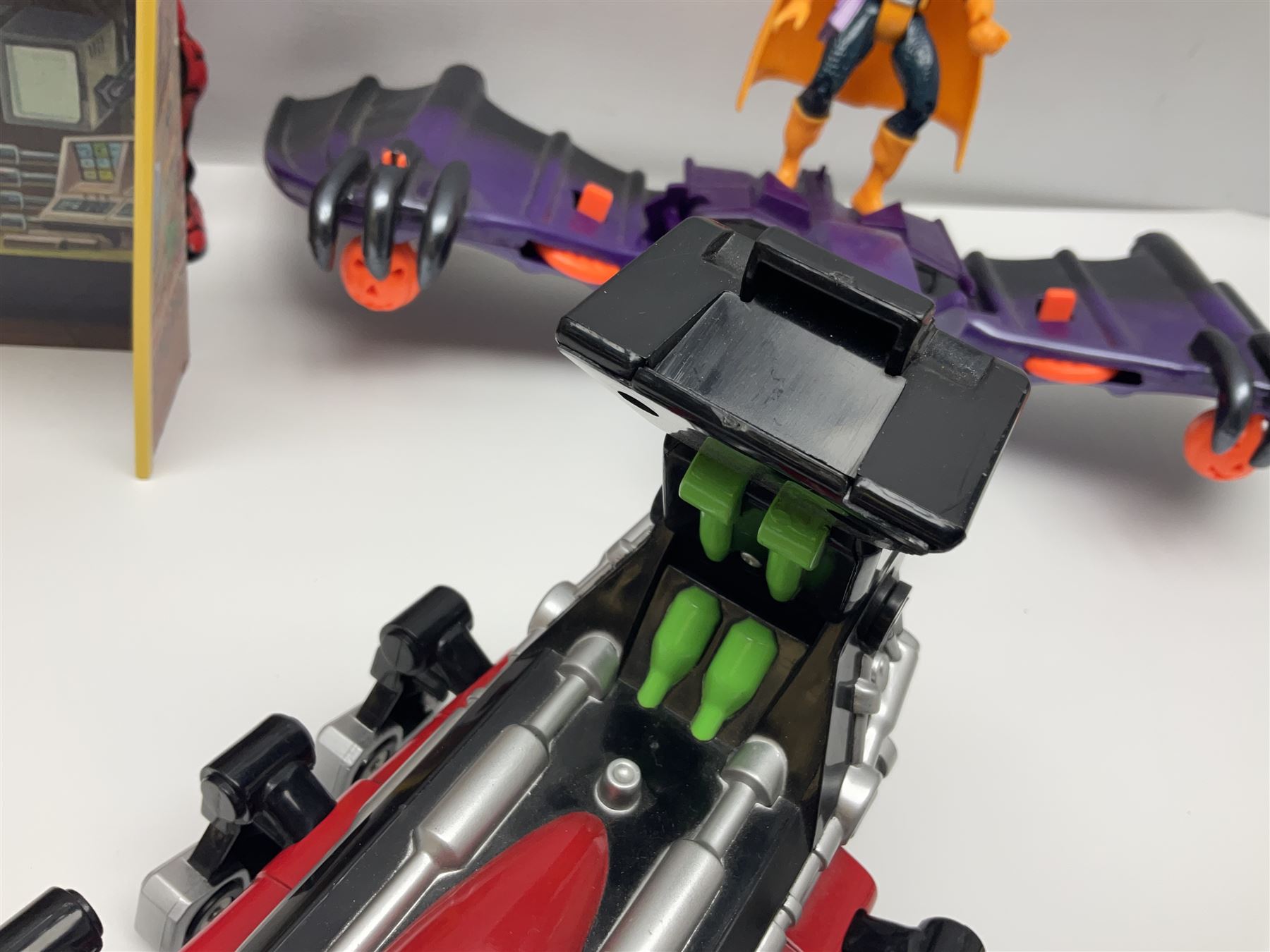 Group of early 90s Marvel/DC Comics toys; 1993 Kenner Batmobile with original Batman figure and plane; Marvel Comics Spider-Man 1994 Web of Steel series Hobgoblin Wing Bomber, incomplete Daily Bugle Playset and Scorpion; assorted figurines and later accessories 