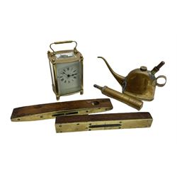 Brass carriage timepiece, brass and wood spirit level stamped ‘Warsden Brothers Sheffield’ and another similar, and other brassware