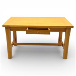 Solid oak dining table and set of seven pine farmhouse chairs including two carvers, rectangular top with tongue and groove style finish, supported a 'H' stretcher with square chamfered legs, pine farmhouse chairs with central splat and turned legs