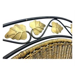 Late 20th century three-piece garden suite, wicker construction and wrought iron frame, decorated with cast metal leaf motifs, cream seat cushions and round back cushions