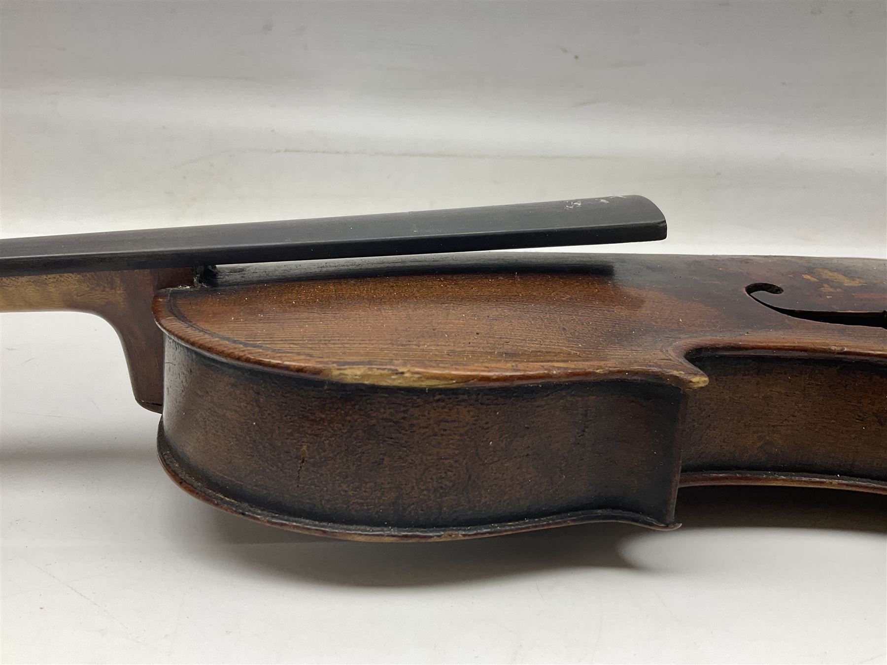 Chinese Parrot violin with 35.5cm two-piece back; L59.5cm in carrying case; and early 20th century German violin for restoration; bears label 'Antonius Stradivarius Faciebat Anno 1730'; cased with bow (2)