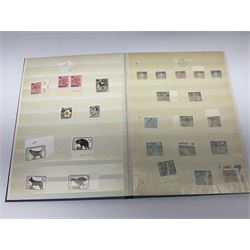 Great British and World stamps, including Queen Elizabeth II mint stamps in presentation packs, PHQ cards, Canada, Rhodesia and Nyasaland etc, in stockbooks and loose