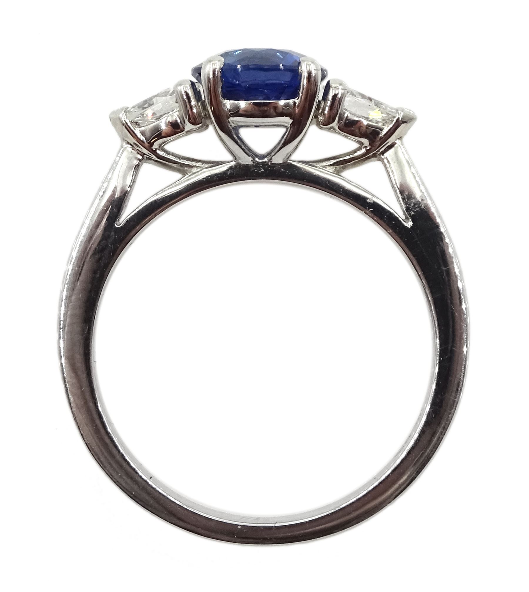 Platinum round Ceylon sapphire and pear shaped diamond three stone ring, hallmarked, sapphire approx 1.50 carat