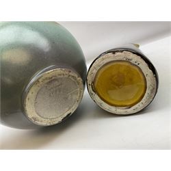 T. Forester Phoenix ware ewer of tapering form decorated with peacock and Bretby twin handled vase decorated with figures fishing in a boat sea scene