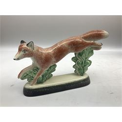 Six Rye Pottery figures, comprising, jumping fox, squirrel upon a branch, billy goat, bull, chicken and cockerel  
