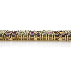9ct gold sapphire, ruby and diamond bracelet, vari-cut blue fancy coloured sapphires, oval cut rubies and round brilliant cut diamonds, Birmingham 2006