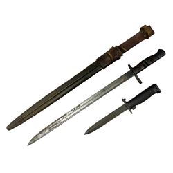 WW1 American Model 1917 Enfield bayonet by Remington with 43cm fullered steel blade; in leather scabbard with frog L59cm overall; and American M5A1 knife bayonet marked MILPAR COL to the cross-piece (no scabbard) (2)