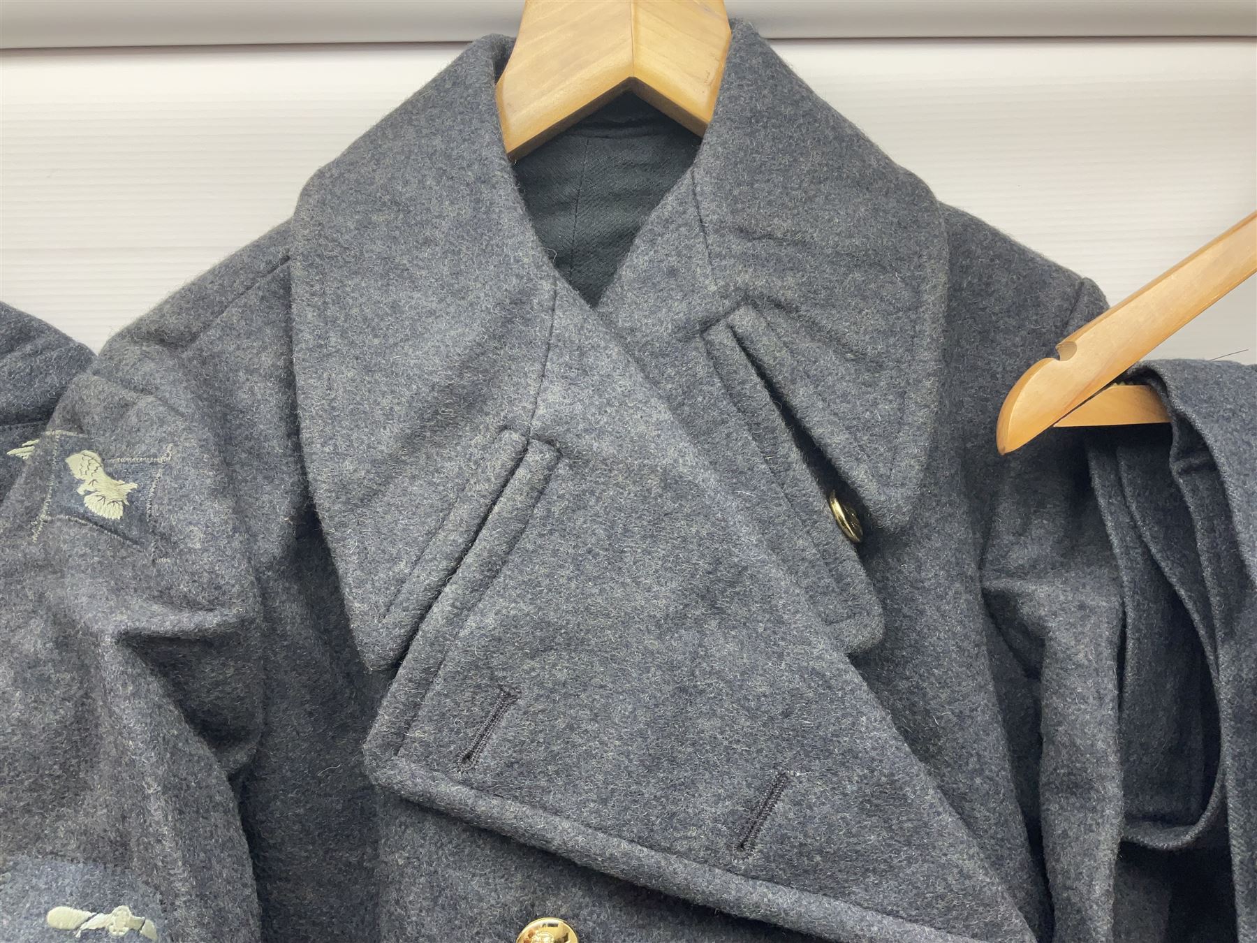 British RAF uniform, including jacket and trousers, modern RAF uniform buttons and a collection of reproduction wartime newspapers