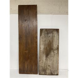 Two 20th century hardwood Dutch folk art Speculaasplank or biscuit moulds, typically carved with figures in traditional dress, largest H101cm