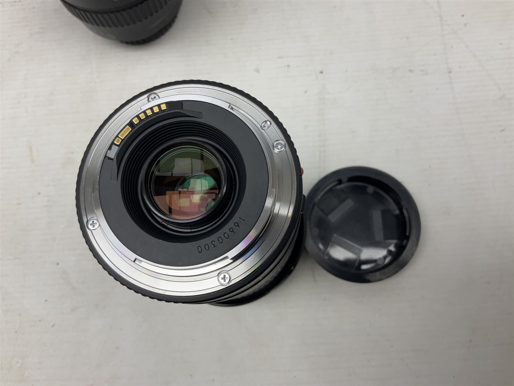 Canon Eos 7D camera body, serial number 3261306344, with 'Canon Ultrasonic EF 24-105mm Macro 0.45m/1.5ft Ultrasonic' Lens, 'Canon Zoom EF 75-300, 1;4-5.6 III' lens and Teleplus Pro 300 lens, together with tripod and original camera box 