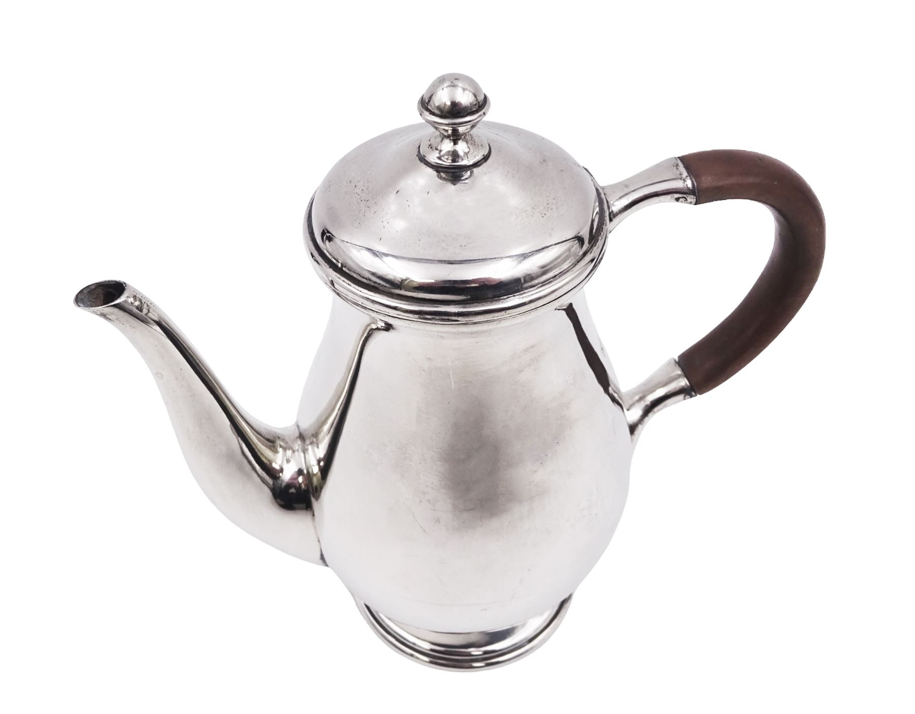 Liberty & Co 1930s small silver coffee pot, of plain baluster form, with brown Bakelite C handle with trefid mounts and cover with spherical knopped finial, upon circular stepped foot, hallmarked Liberty & Co, Birmingham 1934