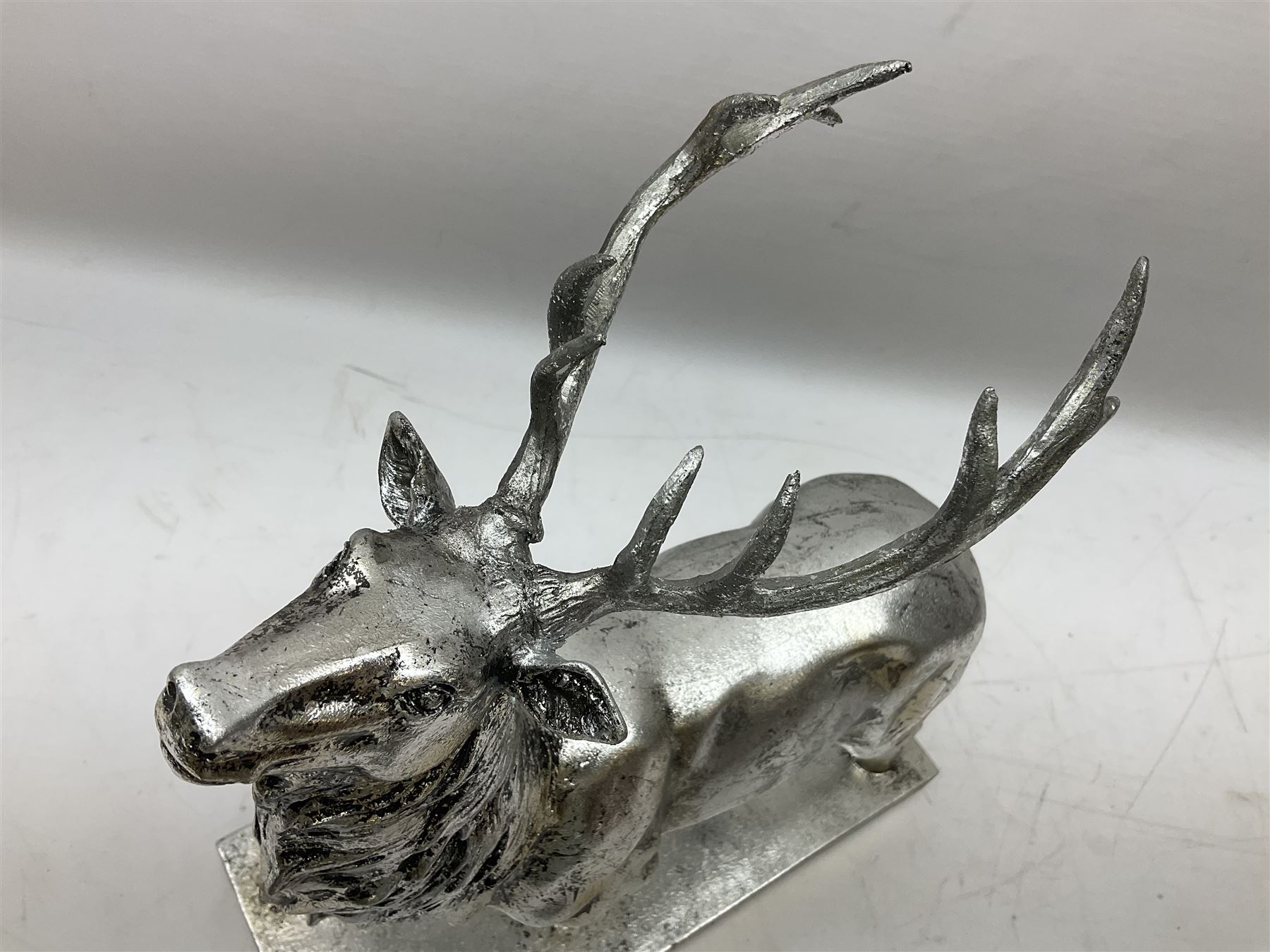 Composite silvered stag, on rectangular base
