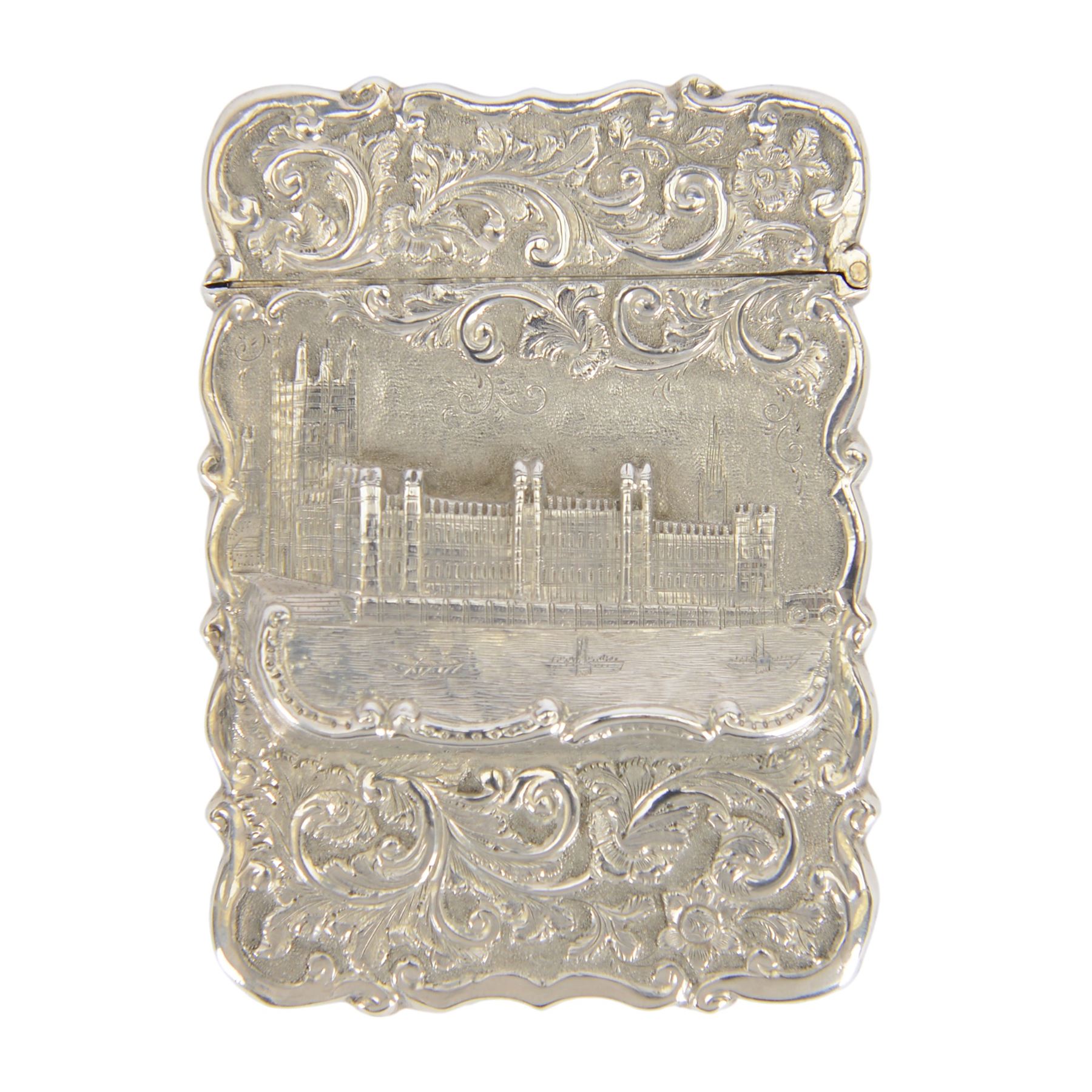 Victorian silver castle-top card case, of rectangular form with scrolling sides, relief embossed with the Houses of Parliament and surrounded by foliate scrolls, with vacant cartouche to reverse, hallmarked Hilliard & Thomason, Birmingham 1862, H9.5cm W6.5cm
