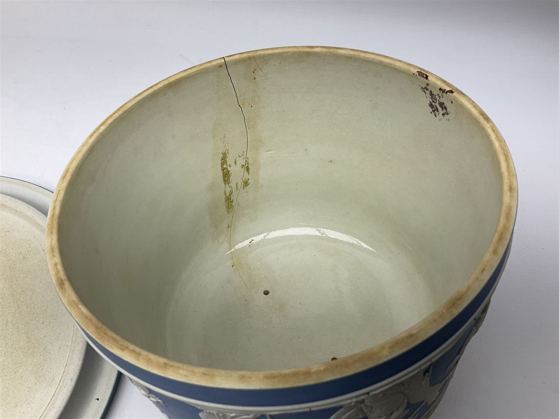 Late 19th century pale blue Wedgwood Jasperware cheese dome with cover, decorated with acorn and oak leaf bands surrounding neo-classical ladies, cherubs, flowers and trees, impressed Wedgwood mark beneath, together with further Wedgwood Jasperware teapots, boxed dishes etc
