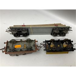 Hornby '0' gauge - sixteen unboxed and playworn goods wagons including bogeyed log carrier, double hopper wagon, side tipping wagons, cable drum wagon, open wagons, flat-truck container carriers, lumber wagons, goods brake vans etc (16)