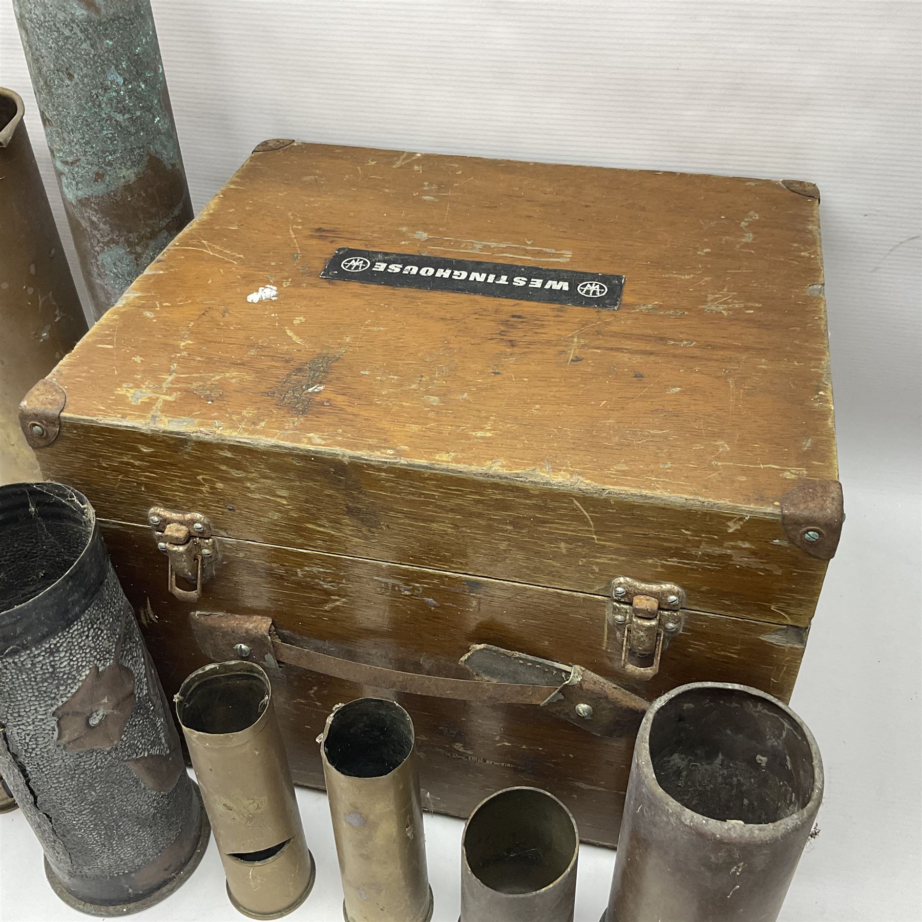 Large collection of shell and bullet casings, including a trench art example, together with a metal cartage case and wooden case