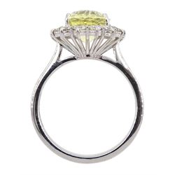 18ct white gold oval yellow sapphire and round brilliant cut diamond cluster ring, hallmarked, sapphire approx 4.20 carat