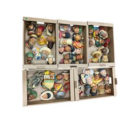 Large collection of Bossons plaster wall-masks, including including fisher man, policeman,...