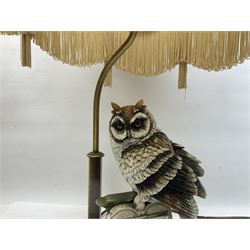 Two Giuseppe Armani figural lamps, the first modelled as an owl perched upon a book, the second modelled as a pair of owls perched upon blackberry branch, each with damask fabric tassel shades, tallest H76cm