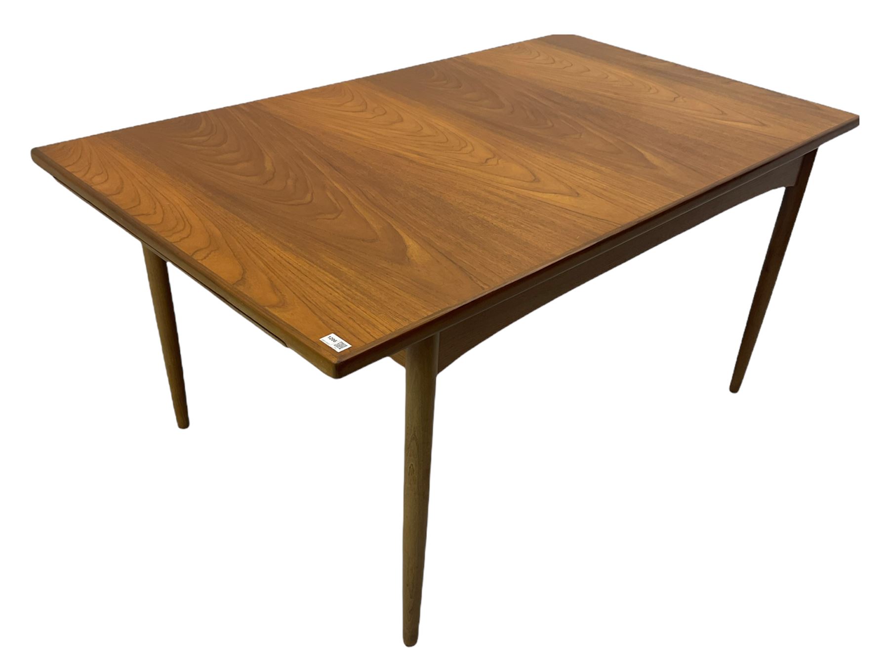 GPlan mid 20th century teak dining table, extending with two leaves