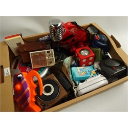  Over twenty novelty and promotional portable radios including Sanyo RP1711 dice, Tomy Mr. D.J., Radio One FM, Thunderbirds, shower and flash light radios, Coca-Cola bottle top, microphone, wind-up gramophone etc  