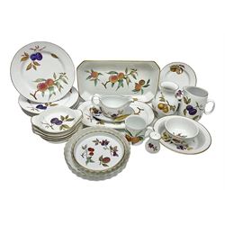 Royal Worcester Evesham pattern dinner wares, including flan dishes, sauce boat, jug, dinner plates, side plates, etc, 