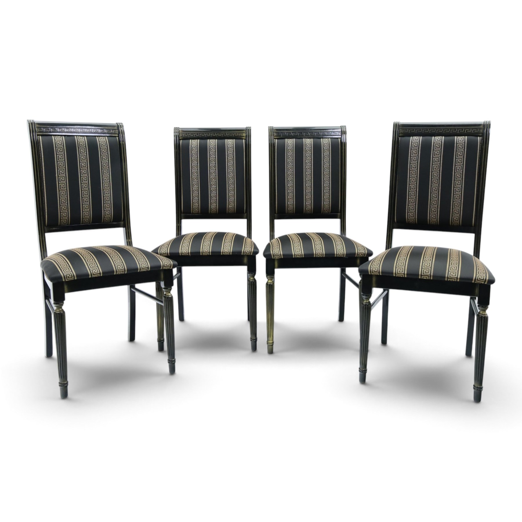 Italian Neoclassical inspired ebonised gloss dining table with four matching chairs,  circular top with additional leaf (Extends to  145cm) with Greek key banding, on a shaped pedestal base with gilt highlights and stepped plinth, the chairs en suite with padded back and seat with Greek key, reeded front supports