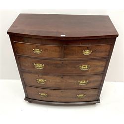 Victorian mahogany bow front chest, two short and three long drawers, turned supports 