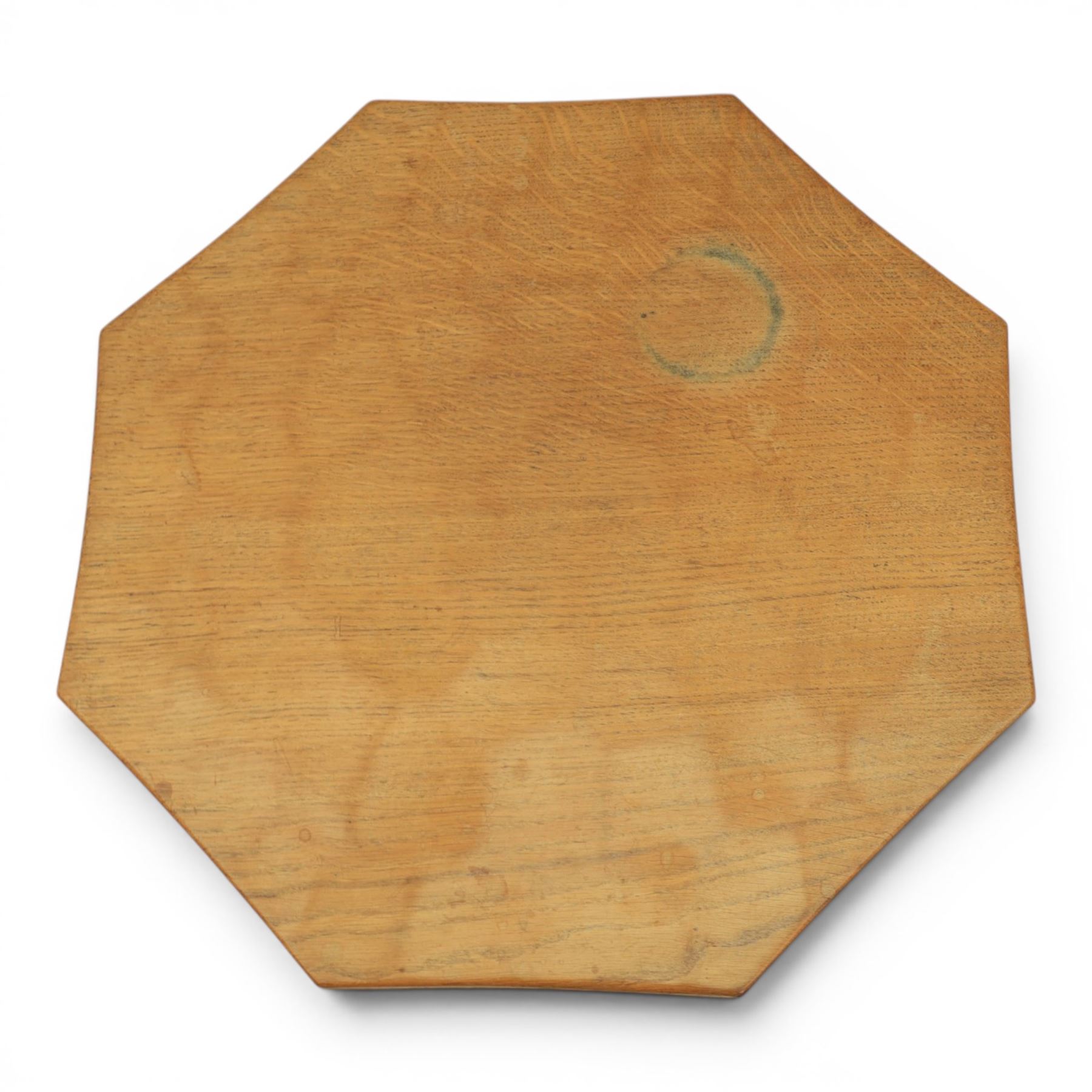 Mouseman - adzed oak octagonal occasional table,  raised on a quatriform base with carved mouse signature, by the workshop of Robert Thompson, Kilburn