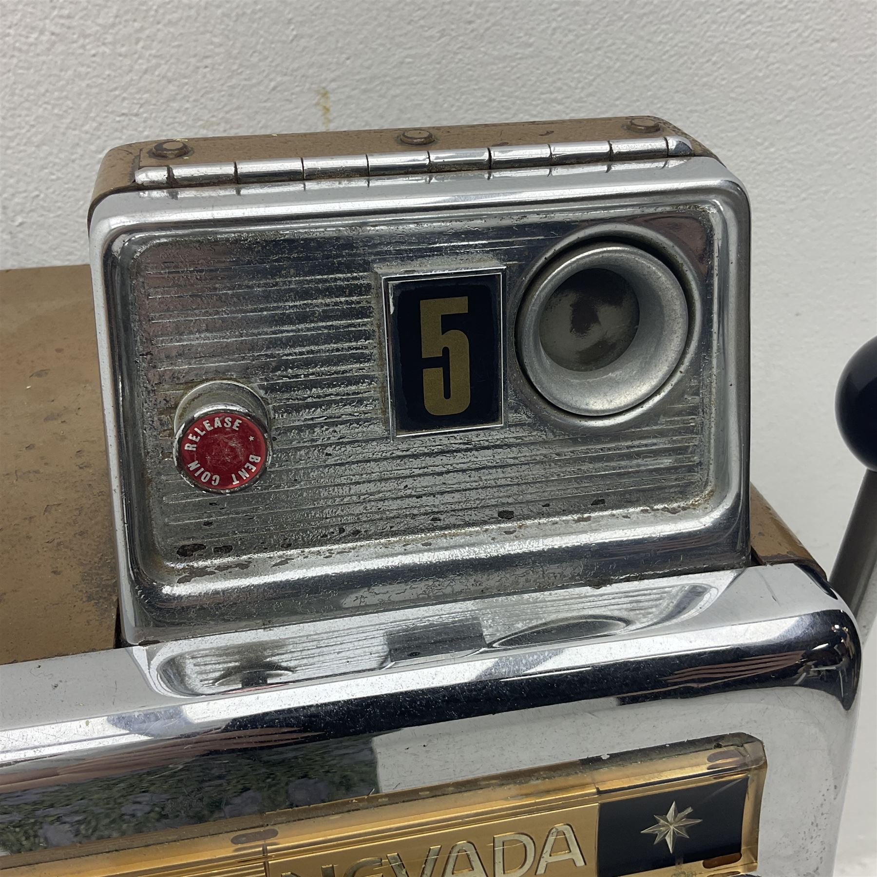 Aristocrat Nevada Lucky Strike one-armed bandit arcade machine, circa 1964, light-up display in aluminium and stainless steel case, with keys, H72cm 