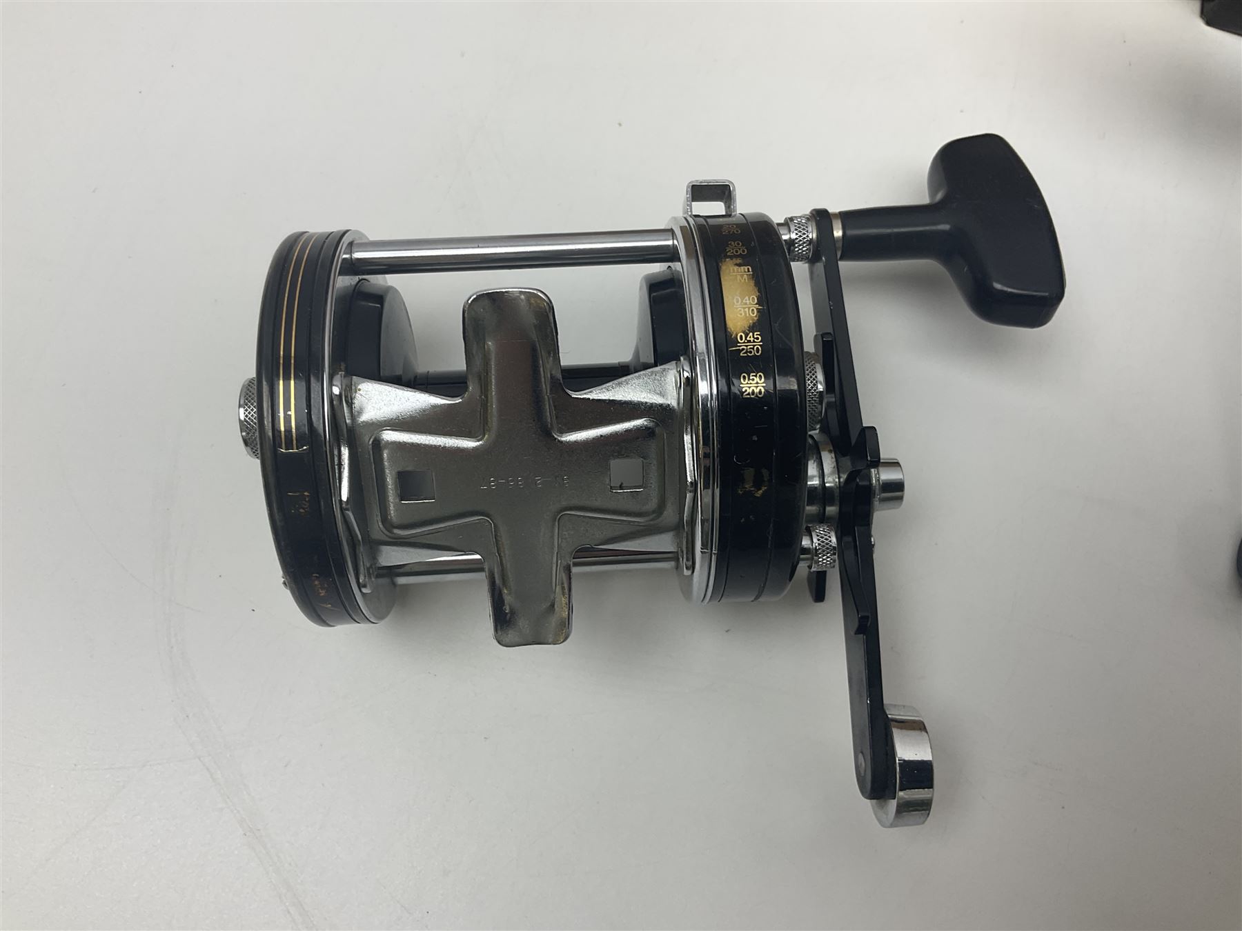 Three multiplier spool sea fishing reels, to include Swedish Abu Ambassaduer 700c Black, with spare spool, Swedish Abu Garcia Ambassadeur 6500 C3 CT MAG and Penn 515 MAG2, all boxed