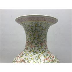 Large Chinese vase of baluster form with foliate decoration upon a white ground, H45cm  