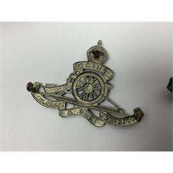 Twelve cap badges including Royal Artillery, 3rd RGA Middlesex Volunteers, Hon. Artillery Company, West Riding and Waraickshire Royal Horse Artillery, Royal Engineers and Army Service Corps (12)